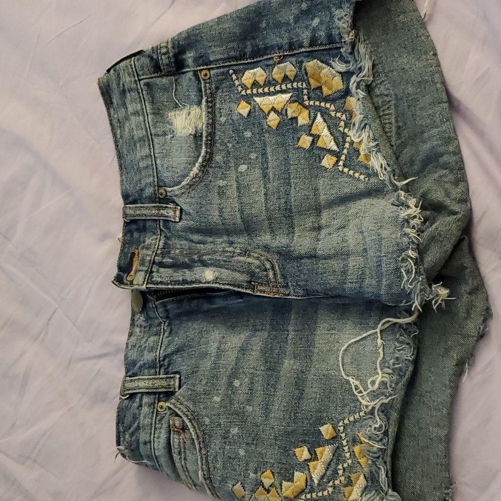 free people jean shorts with stitching and wear size 25